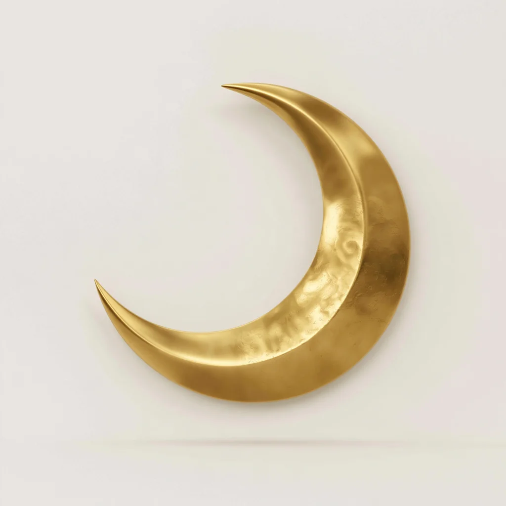 Polished gold crescent moon sculpture