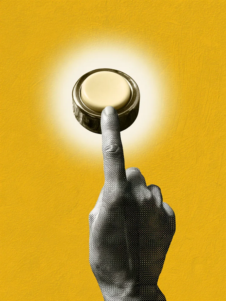 Halftone hand pressing a vintage typewriter key in a white halo on golden yellow