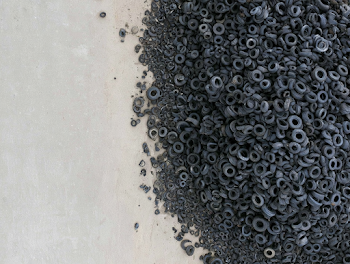 Aerial View of Discarded Rubber Tires in Industrial Yard