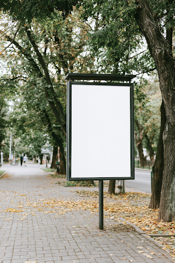 Blank Advertising Poster in Urban Street Scene