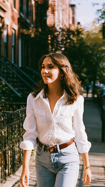 Candid Urban Walk: Trendy Woman in Natural Light