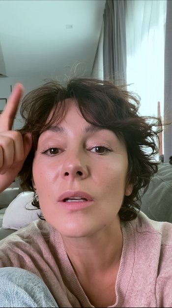 Casual At-Home Selfie of Surprised Middle-Aged Woman