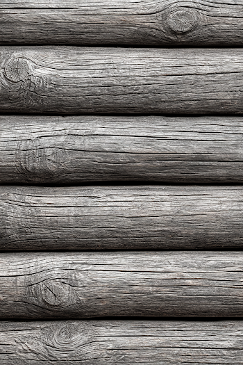 Close-Up of Weathered Log Cabin Wall Texture