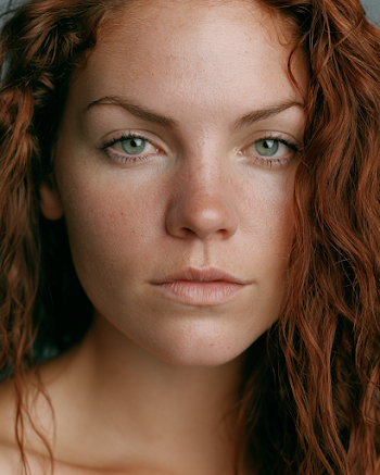 Confident Portrait of a Woman with Copper Auburn Hair