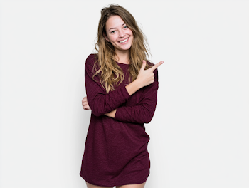 Confident Young Woman in Burgundy Dress
