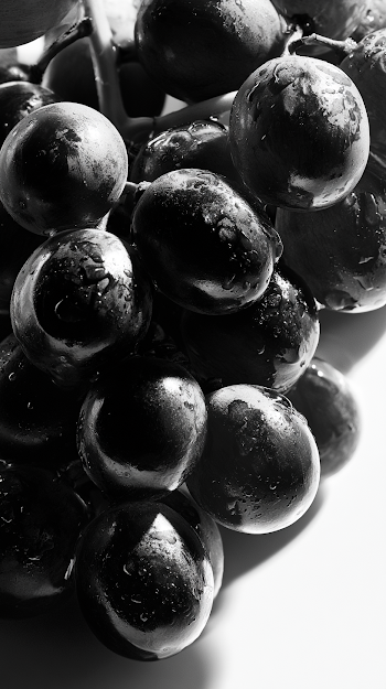 Elegant Black and White Close-Up of Red Grapes
