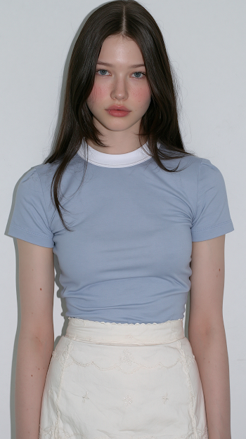 Elegant Young Woman in Soft Pastel Fashion Portrait