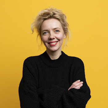 Excited Scandinavian Professional Woman in Modern Studio