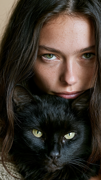 Intimate Beauty Portrait of a Woman and Black Cat