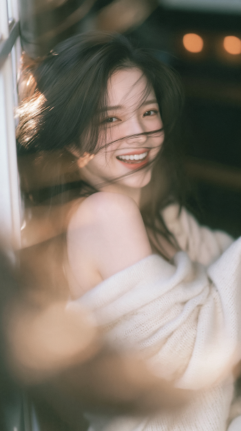 Joyful Portrait of a Young East Asian Woman in Soft Lighting