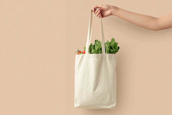 Minimalist Studio Photography of a Cotton Tote Bag with Groceries