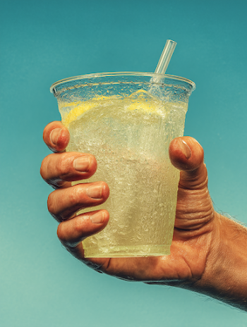 Refreshing Cold Lemonade in Hand