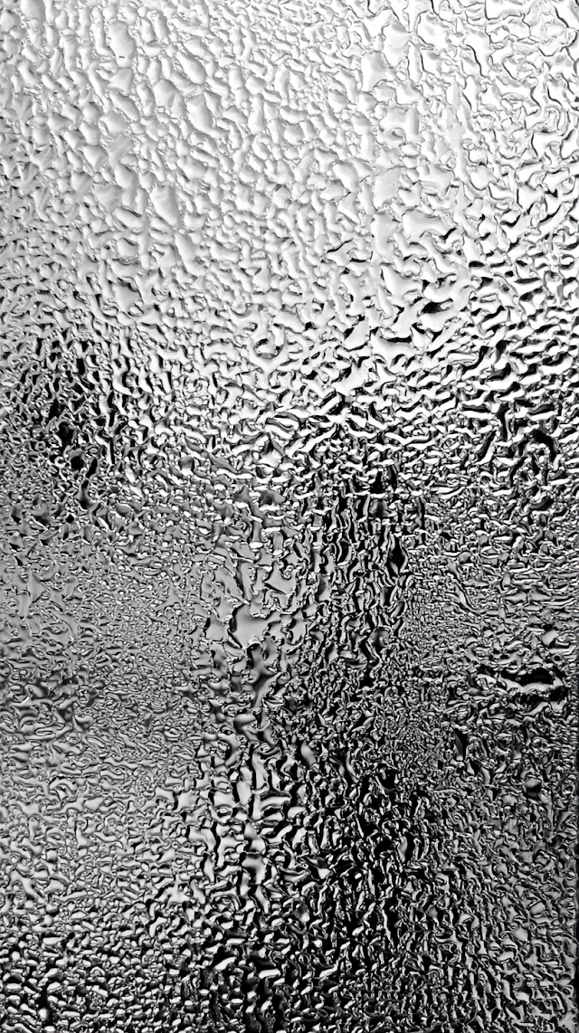 Abstract Macro Rainwater Droplets on Textured Glass