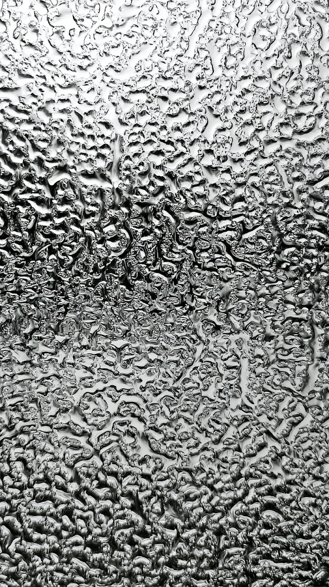 Abstract Rainwater Droplets on Textured Glass