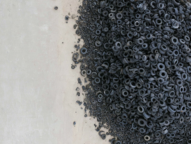 Aerial View of Discarded Rubber Tires in Industrial Yard