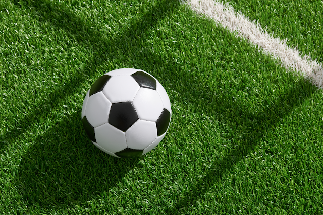 Classic Black and White Soccer Ball on Artificial Turf