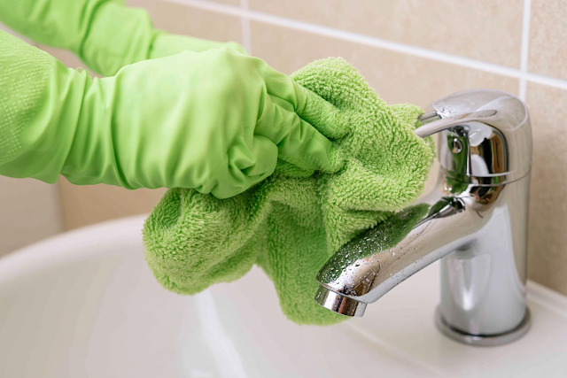 Close-Up of Cleaning in a Modern Bathroom