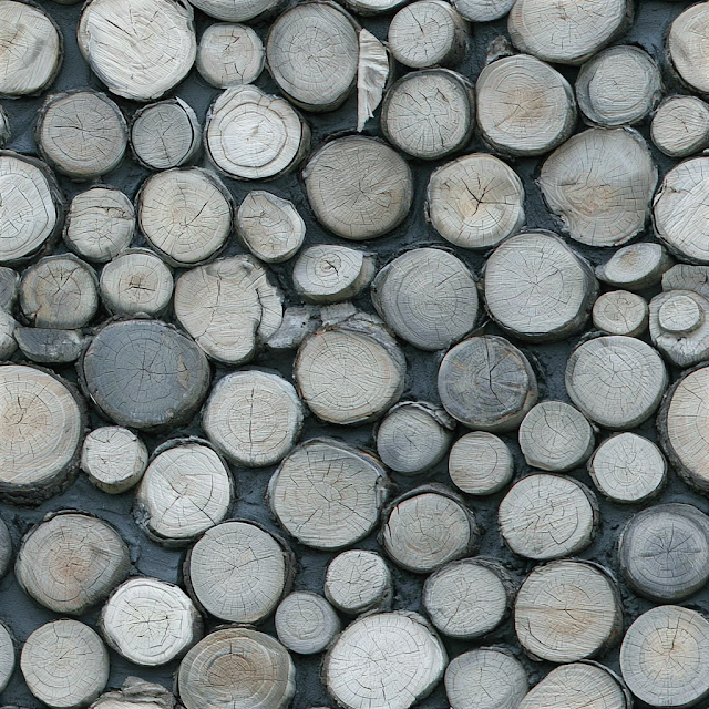 Close-Up of Stacked Wooden Logs