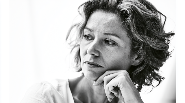 Confident Businesswoman in Thoughtful Reflection