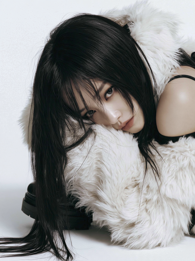 Contemplative Elegance: Fashion Portrait of a Young Woman in Faux Fur