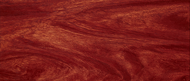 Extreme Close-Up of Polished Mahogany Wood Grain