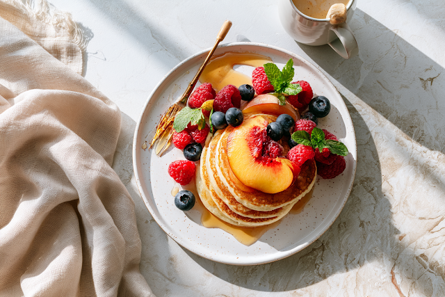 Fresh Summer Breakfast with Fluffy Pancakes and Berries