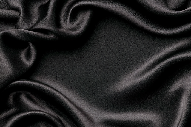 Luxurious Black Satin Silk Fabric Background