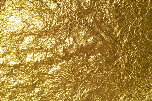 Luxurious Crumpled Gold Foil Abstract Texture