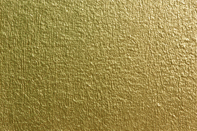 Macro Close-Up of Textured Metallic Gold Surface