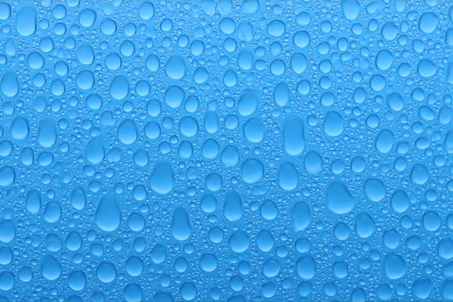 Macro Water Droplets on Glass Surface