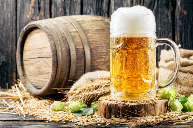Rustic Still Life of Beer Stein with Golden Lager