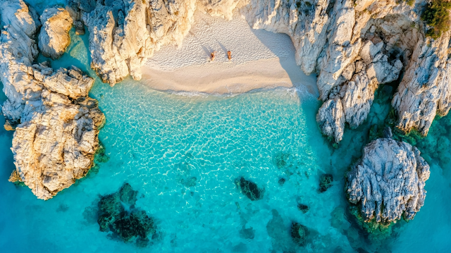 Secluded Mediterranean Beach Cove with Crystal Clear Waters