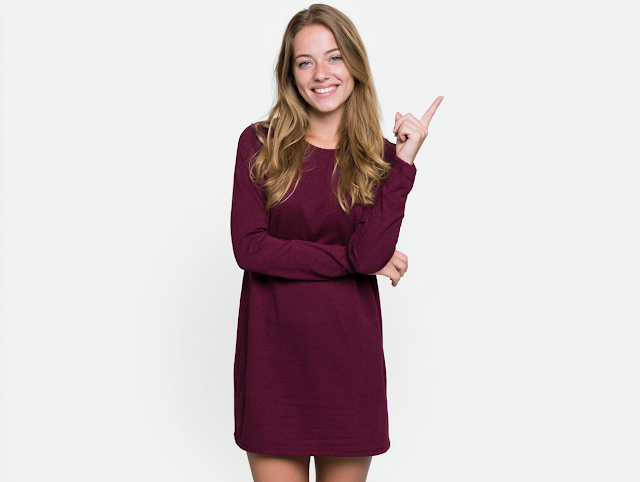 Smiling Young Adult Woman in Burgundy Dress Against White Background