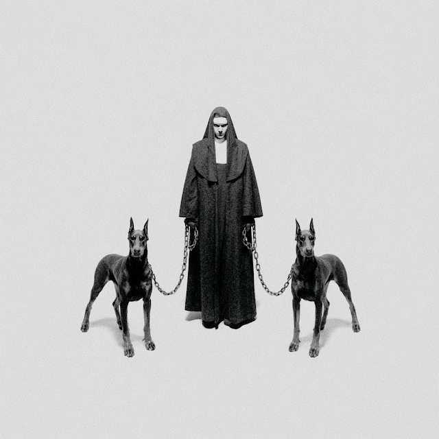 Stern Nun with Aggressive Doberman Pinschers