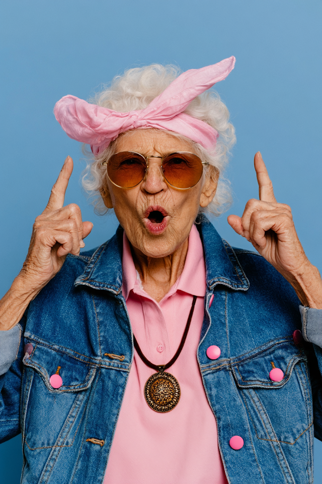 Vibrant Aged Woman Portrait with Pink Accessories