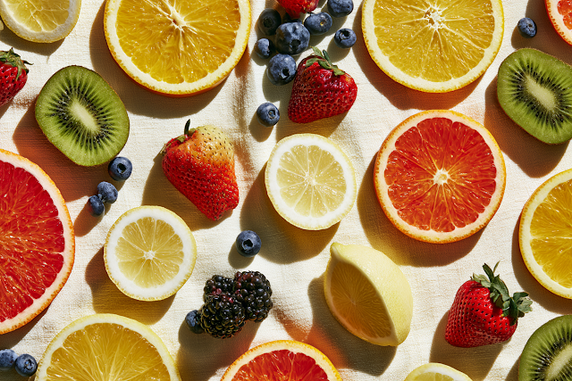 Vibrant Flatlay of Citrus and Tropical Fruits