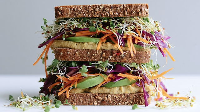 Vibrant Vegetarian Sandwich Stack on Rustic Bread